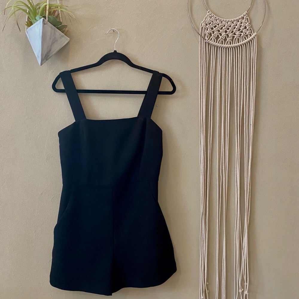 Black jumpsuit.